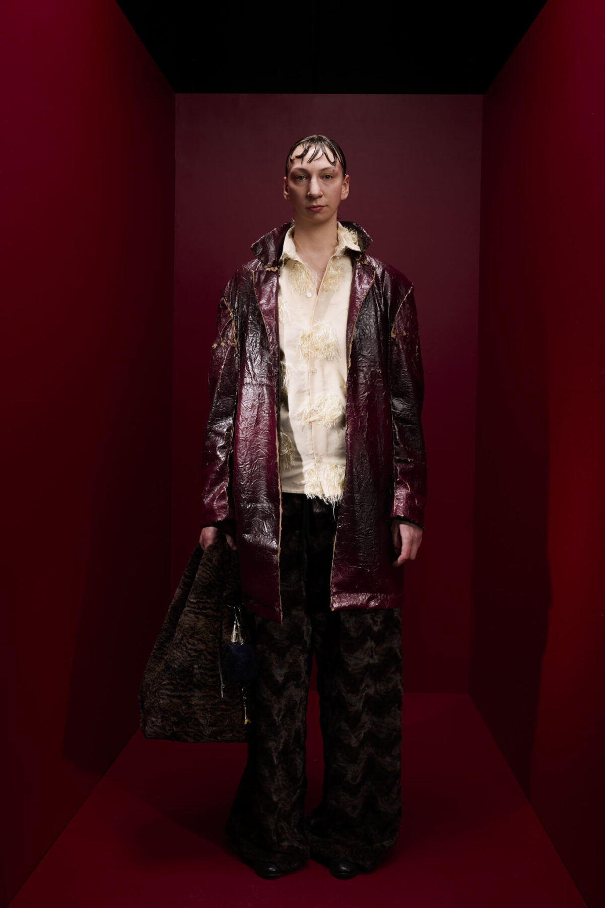 Model wearing Aalto University graduate collection