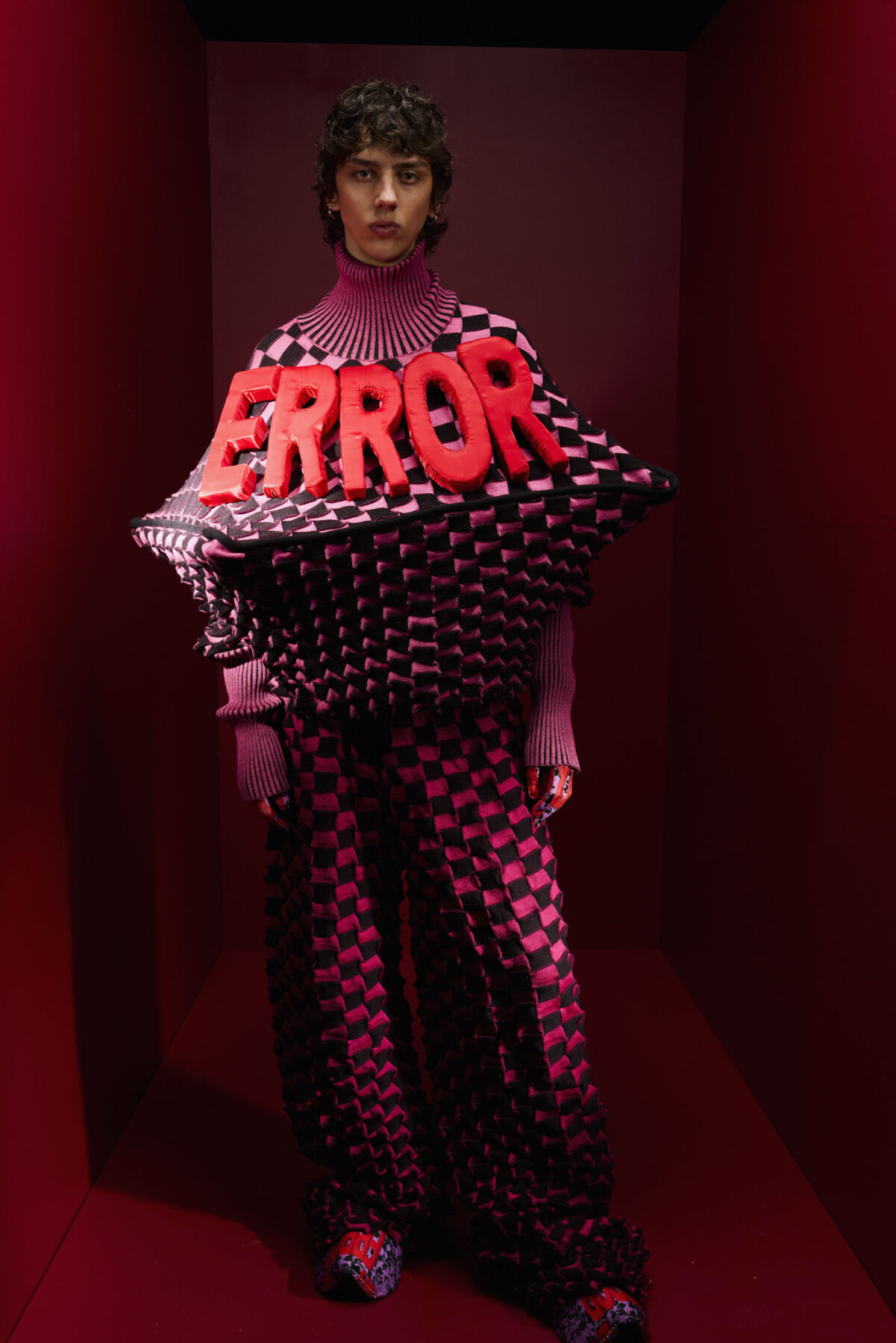 Model wearing Aalto University graduate collection