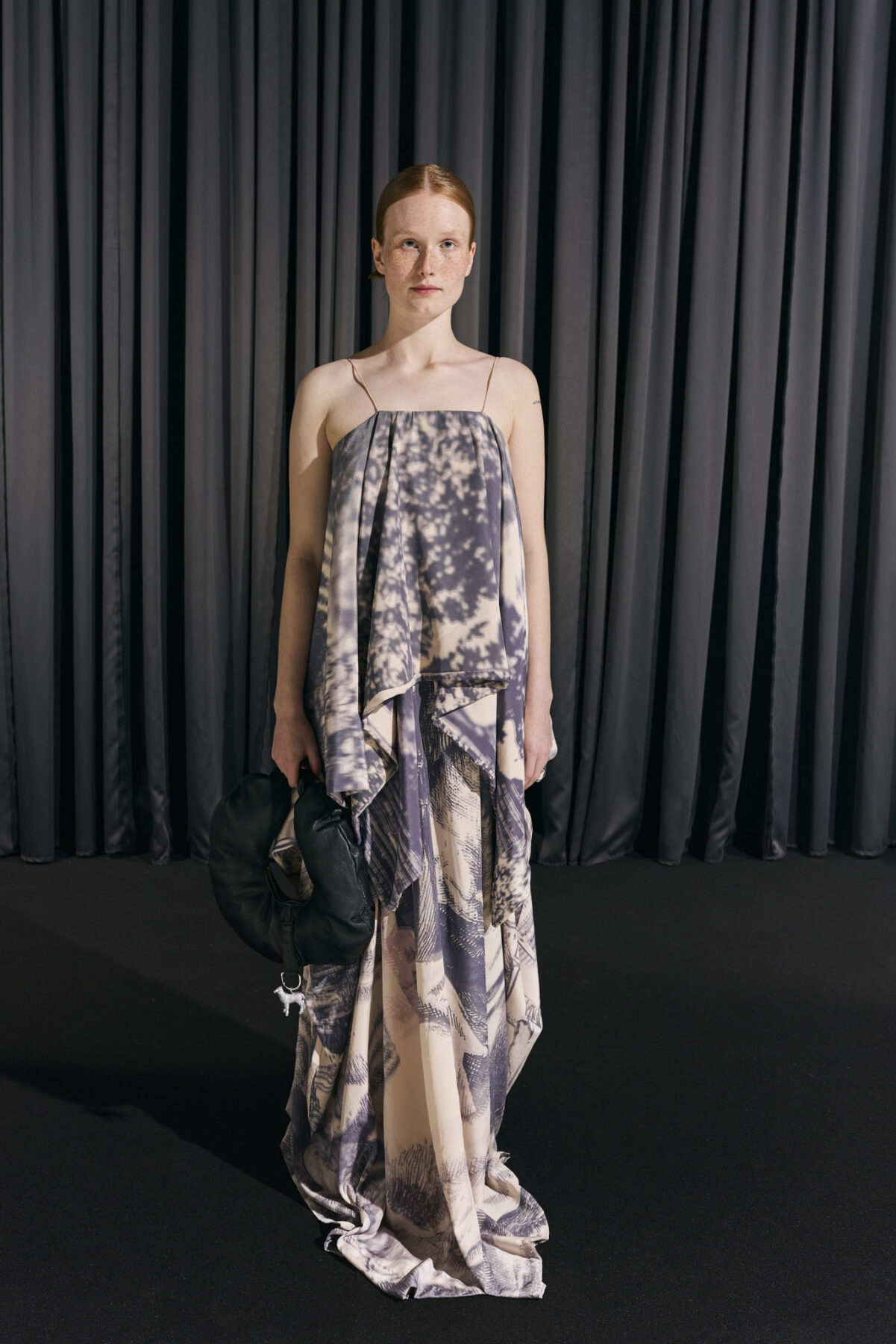 Model wearing Aalto University graduate collection