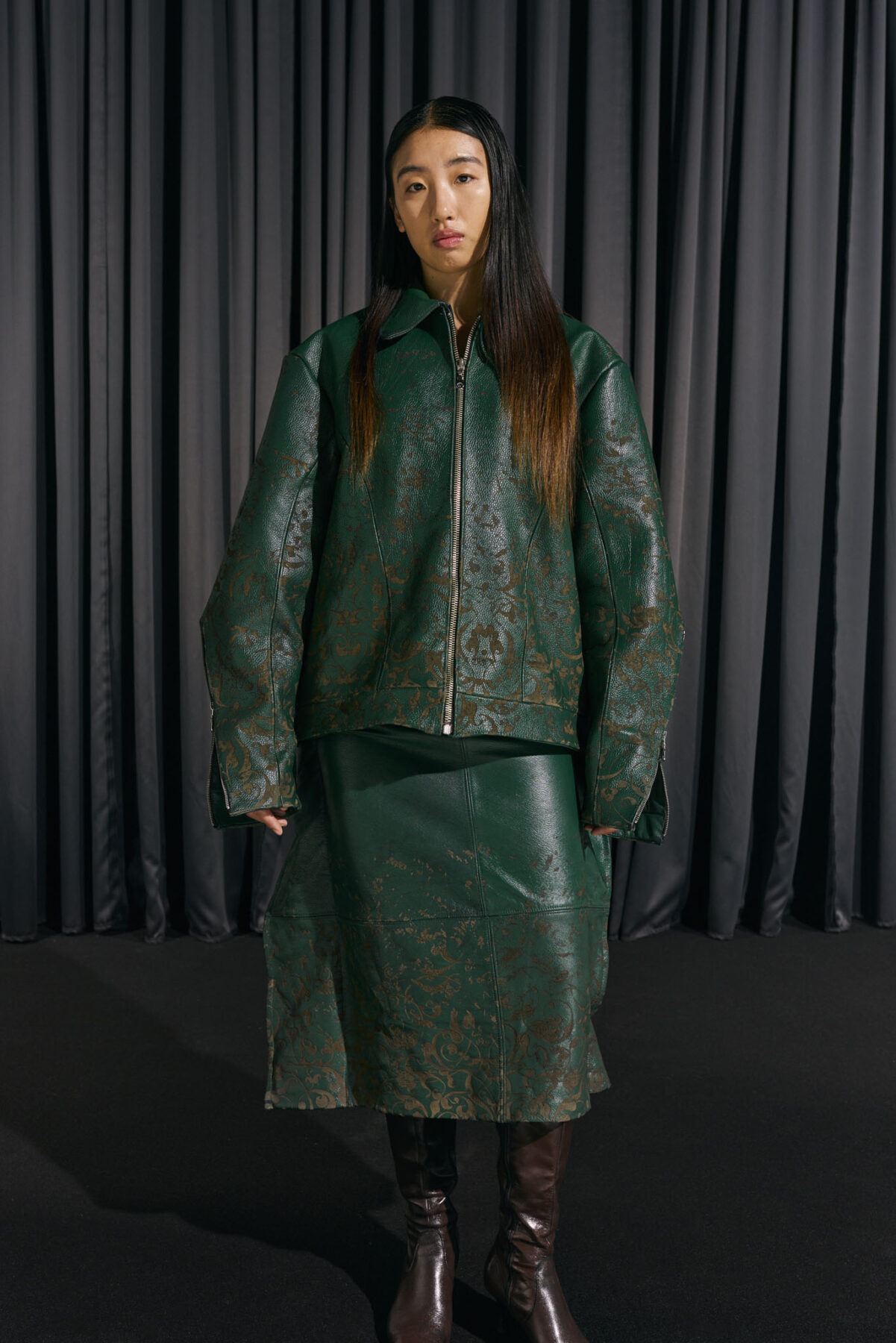Model wearing Aalto University graduate collection