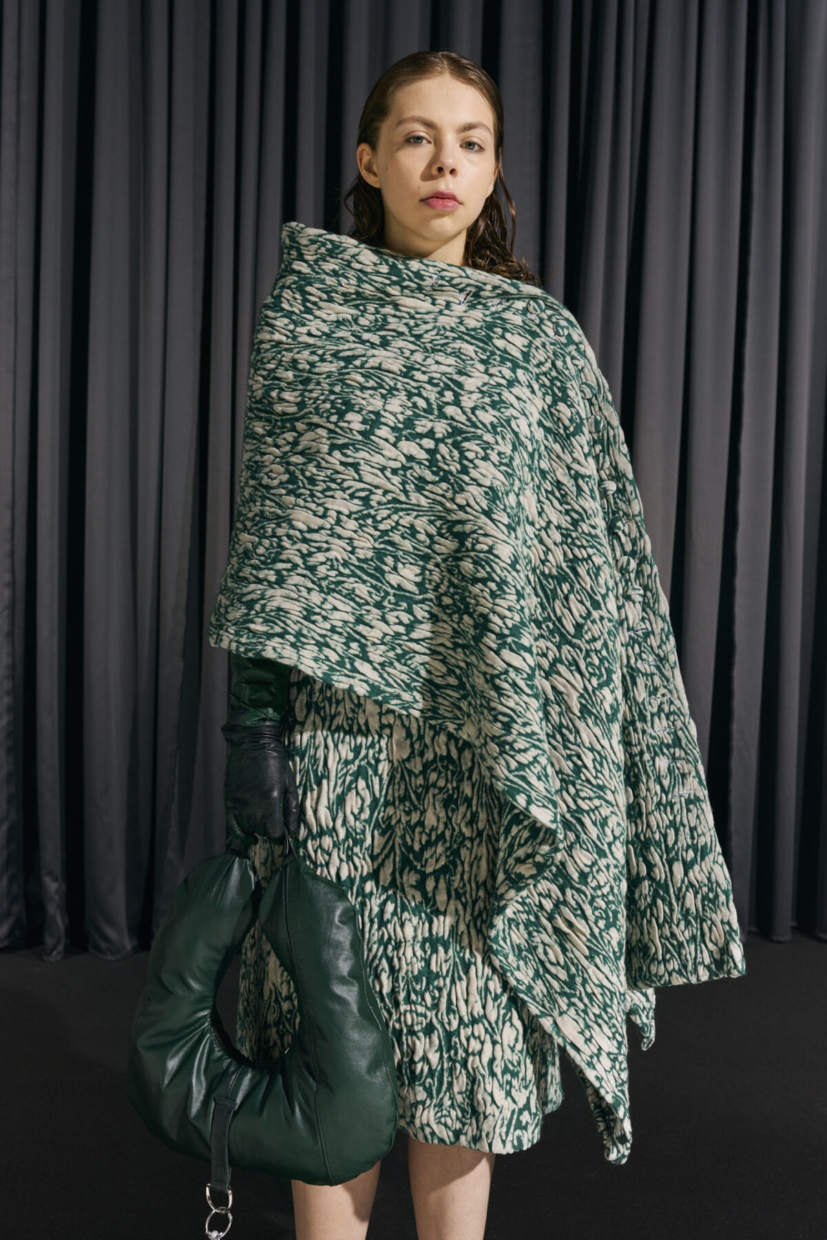 Model wearing Aalto University graduate collection