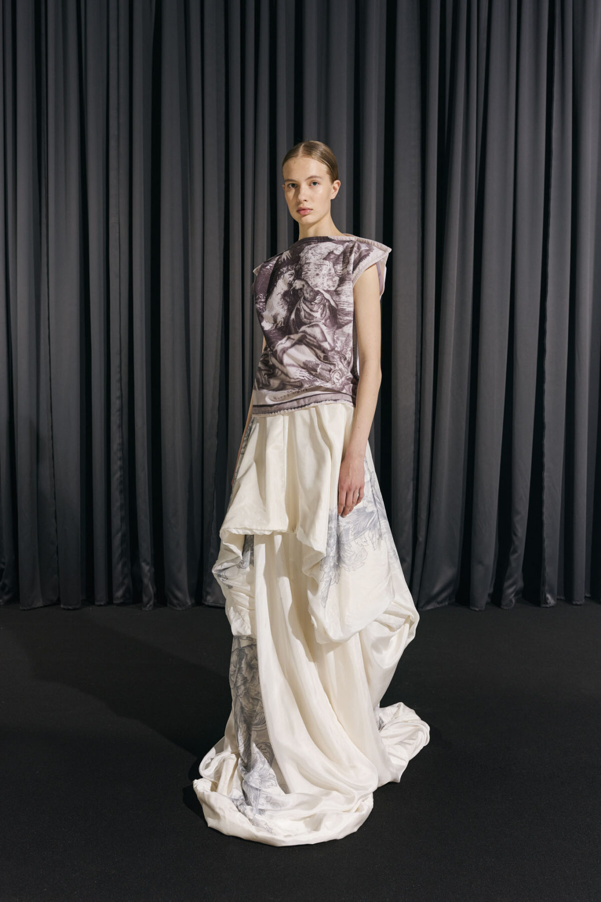 Model wearing Aalto University graduate collection