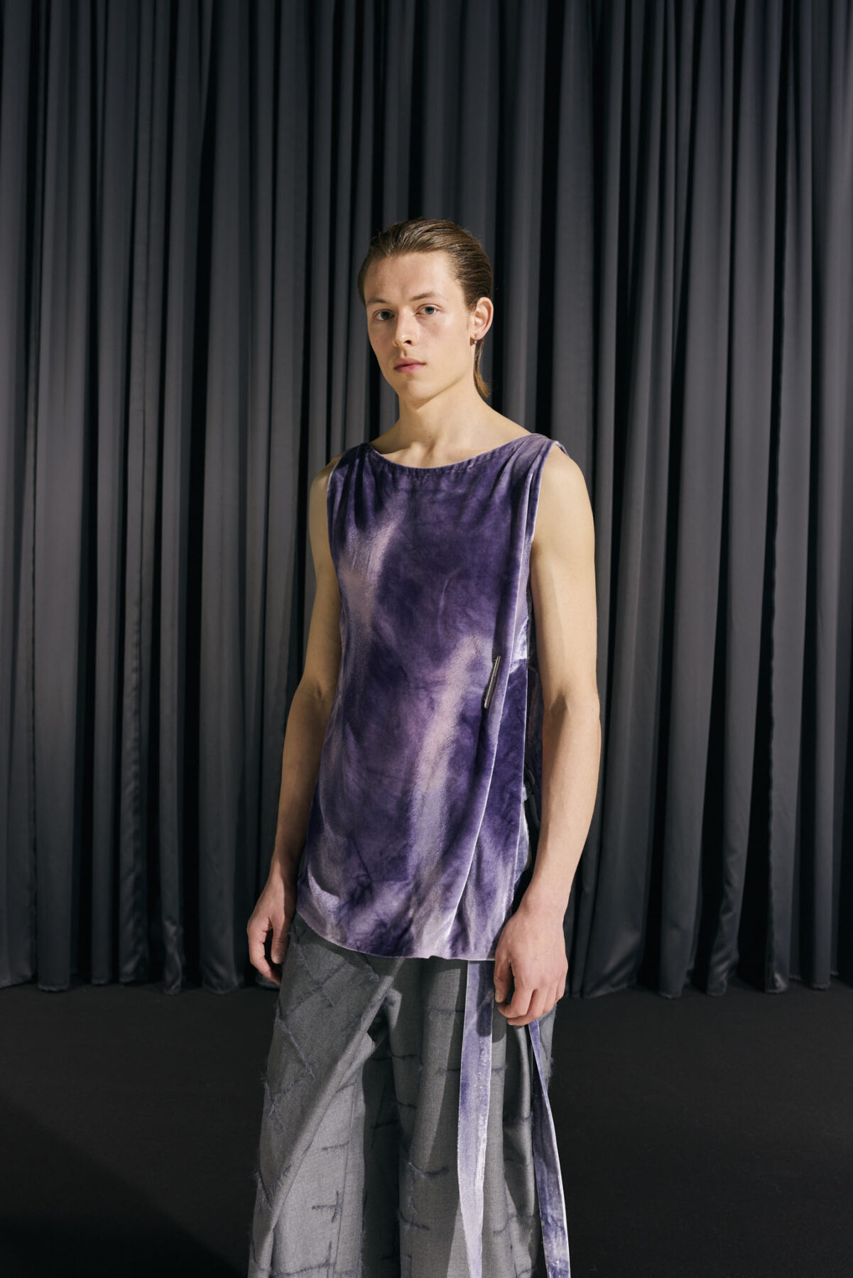 Model wearing Aalto University graduate collection