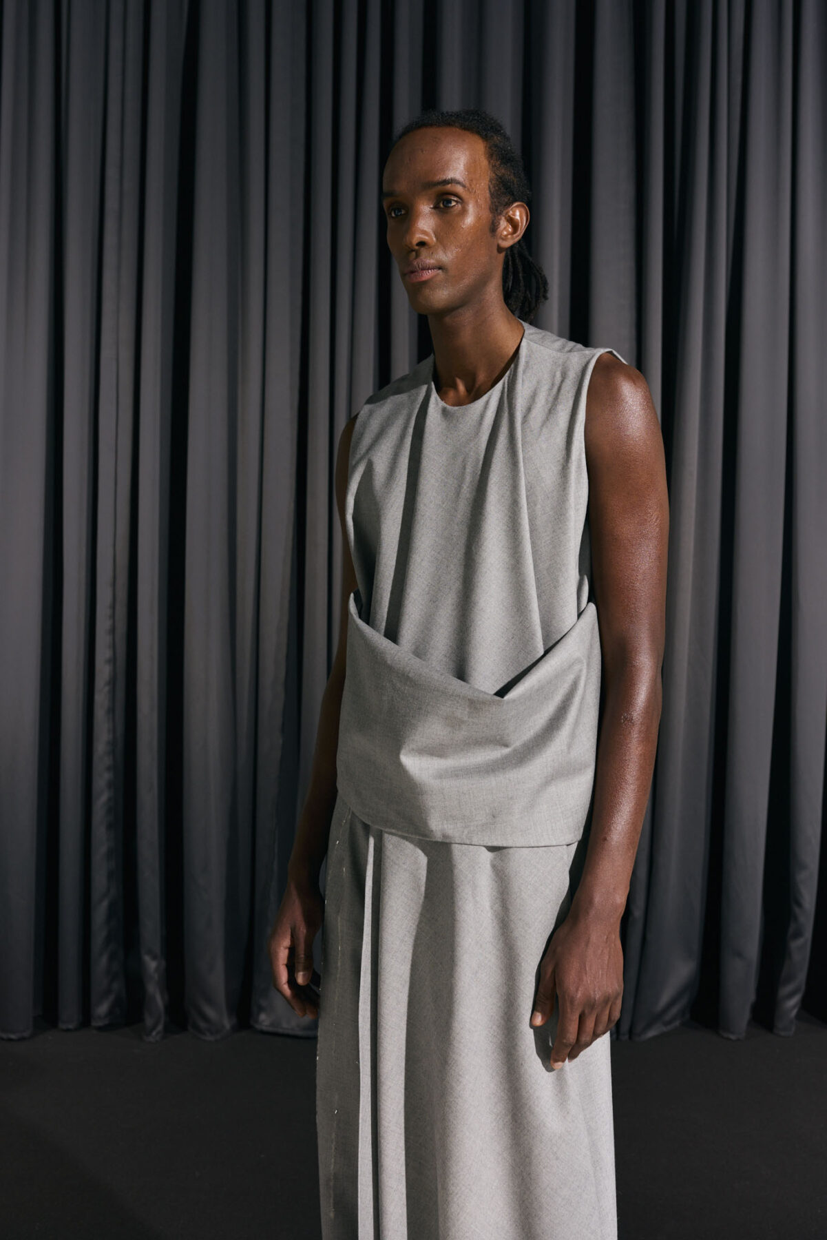Model wearing Aalto University graduate collection