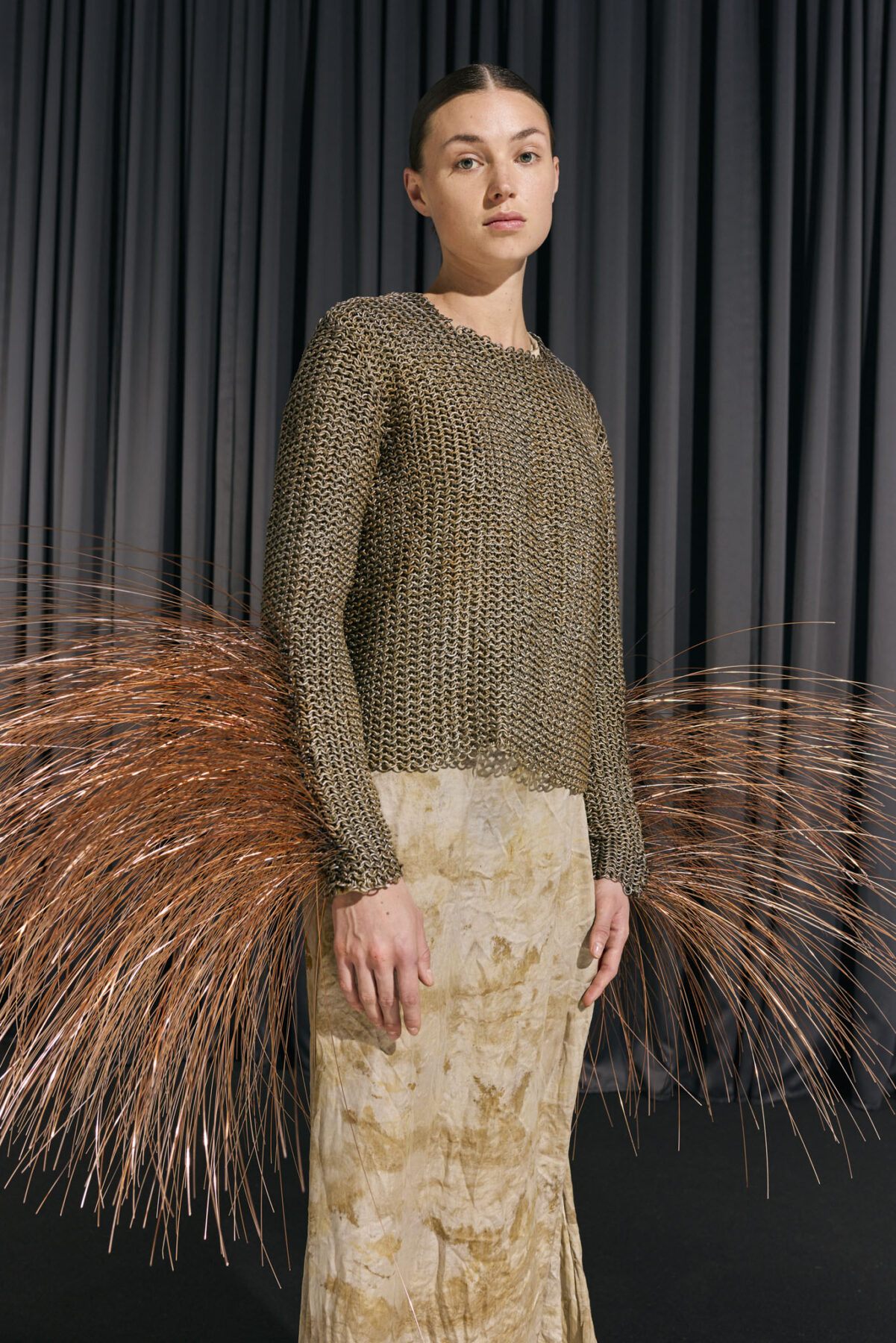 Model wearing Aalto University graduate collection