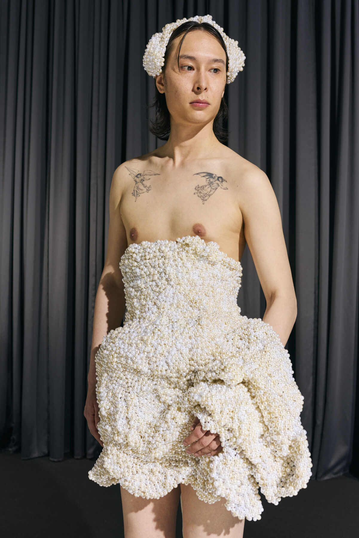 Model wearing Aalto University graduate collection