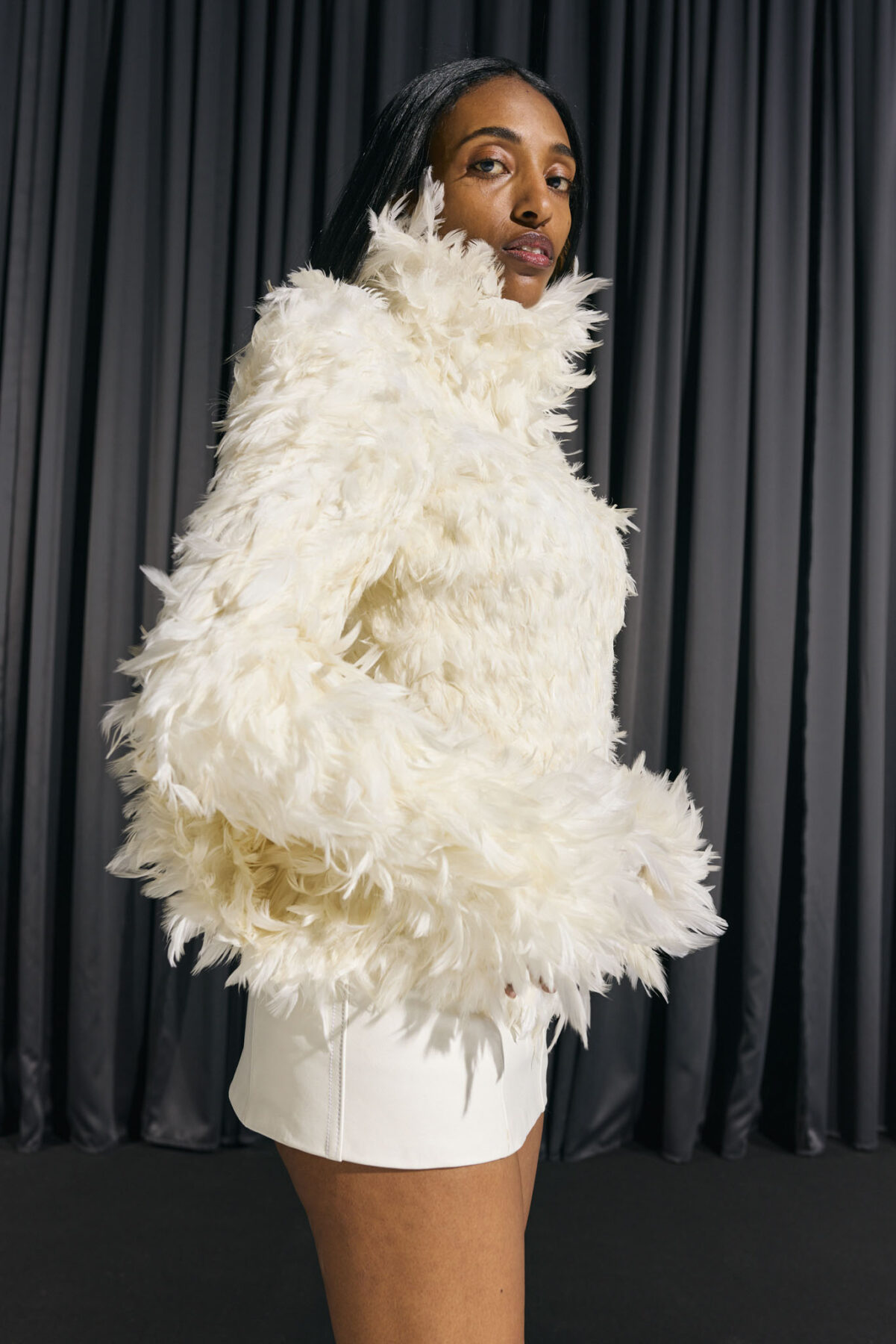 Model wearing Aalto University graduate collection