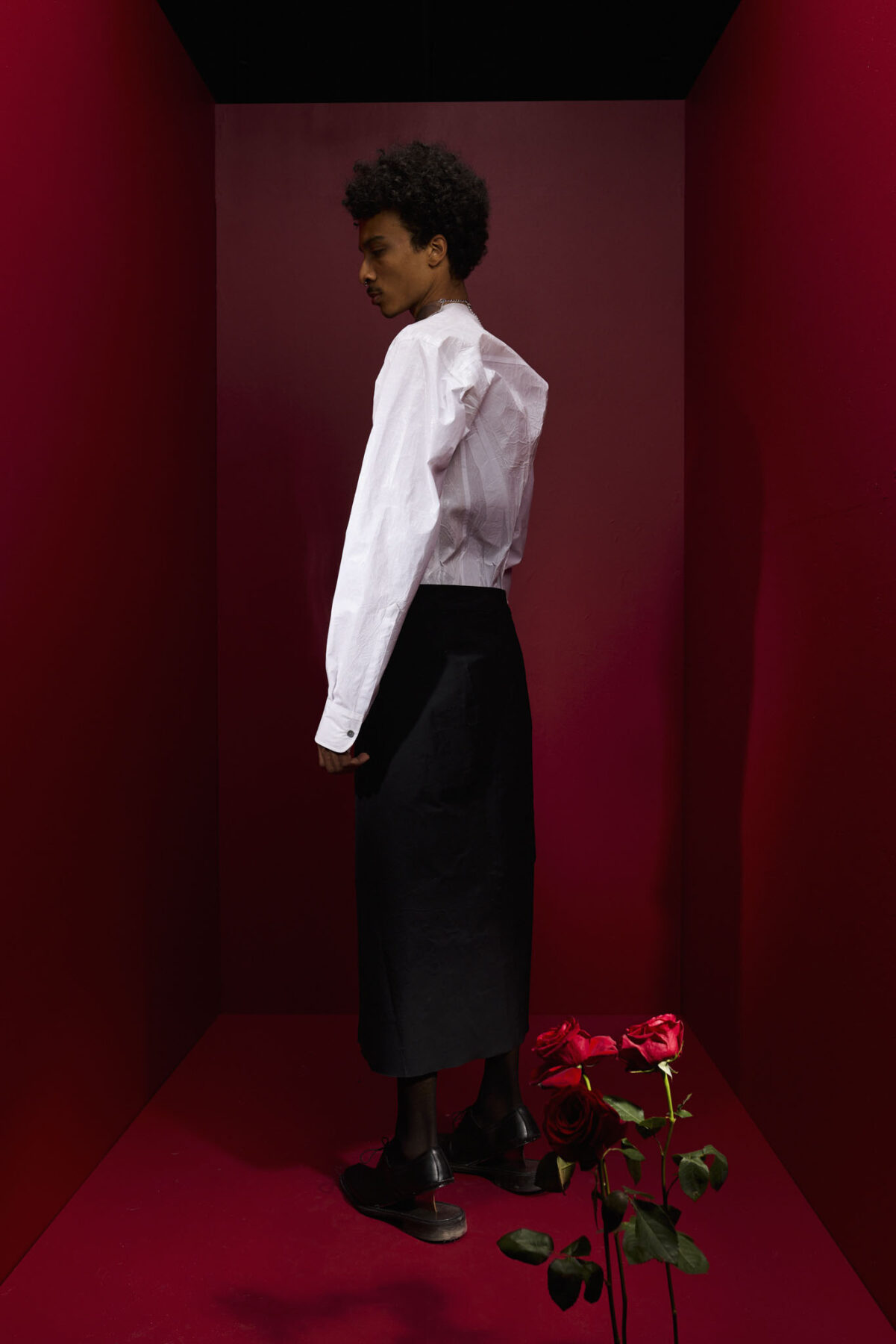 Model wearing Aalto University graduate collection