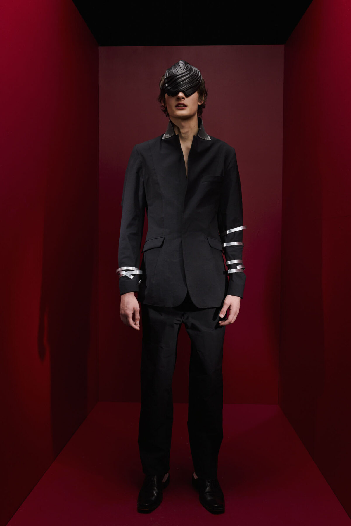 Model wearing Aalto University graduate collection