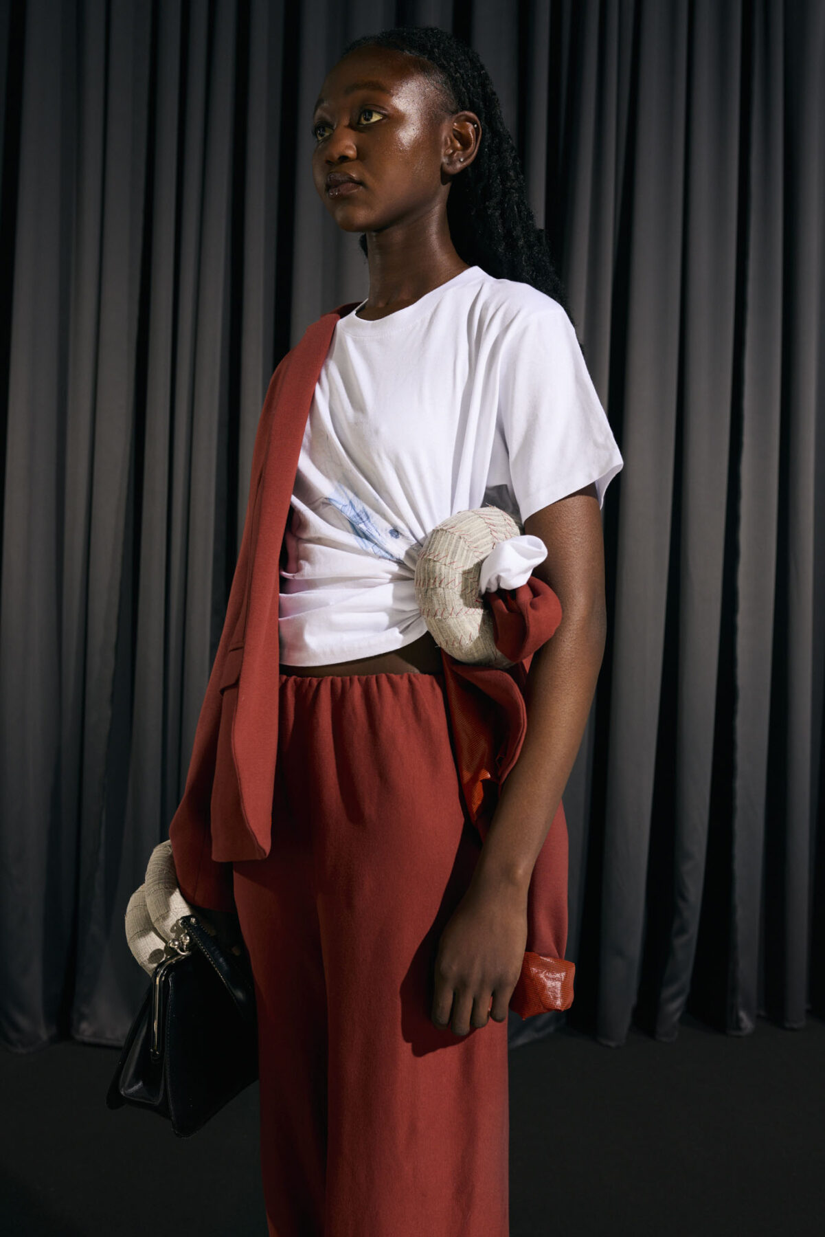 Model wearing Aalto University graduate collection