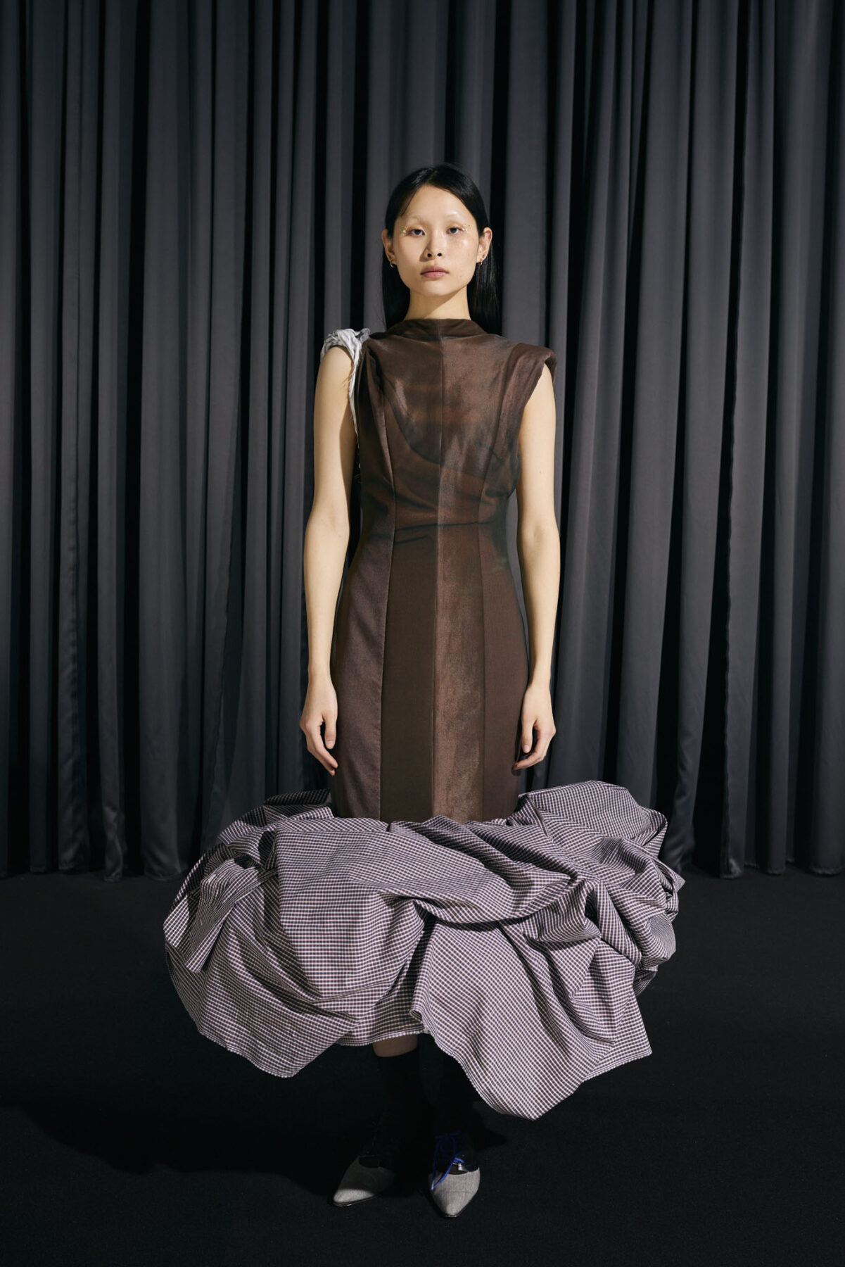 Model wearing Aalto University graduate collection