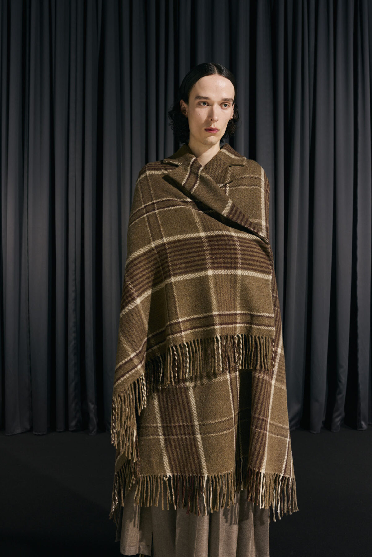 Model wearing Aalto University graduate collection