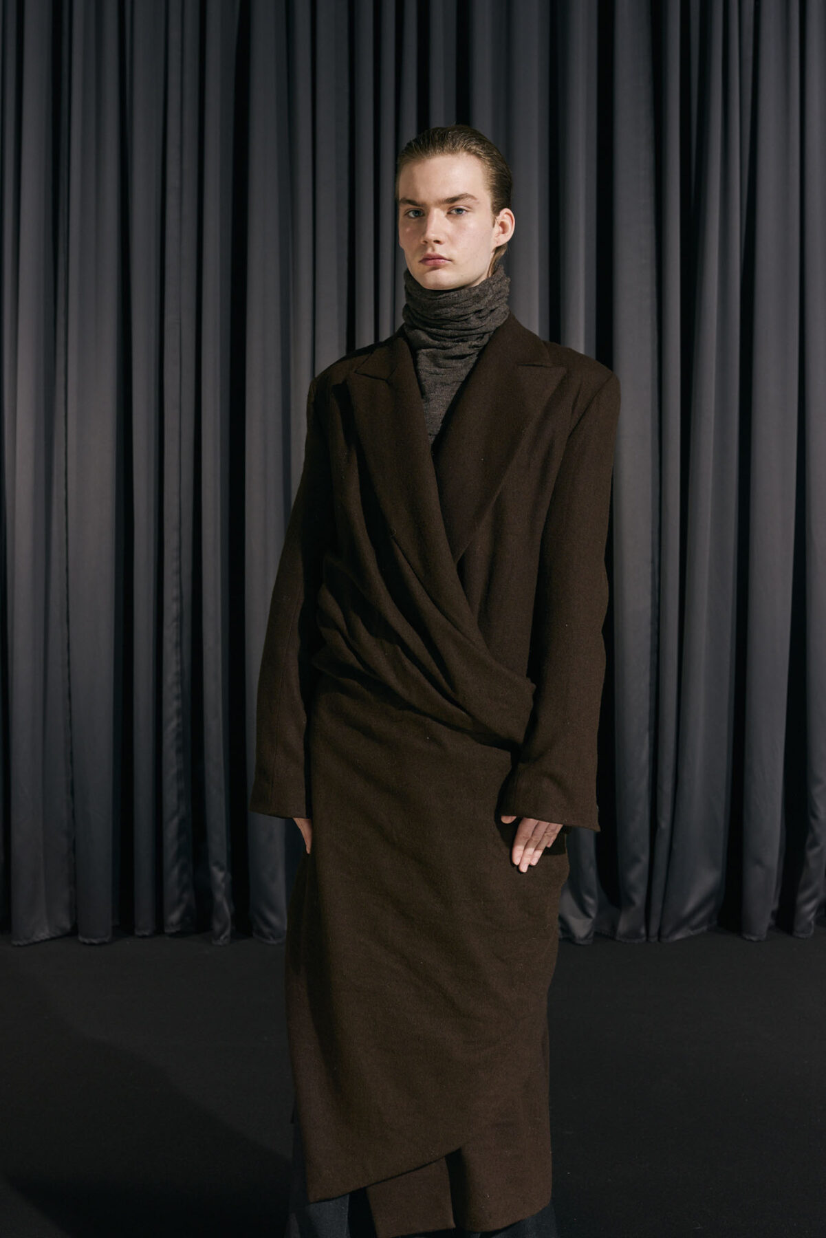 Model wearing Aalto University graduate collection