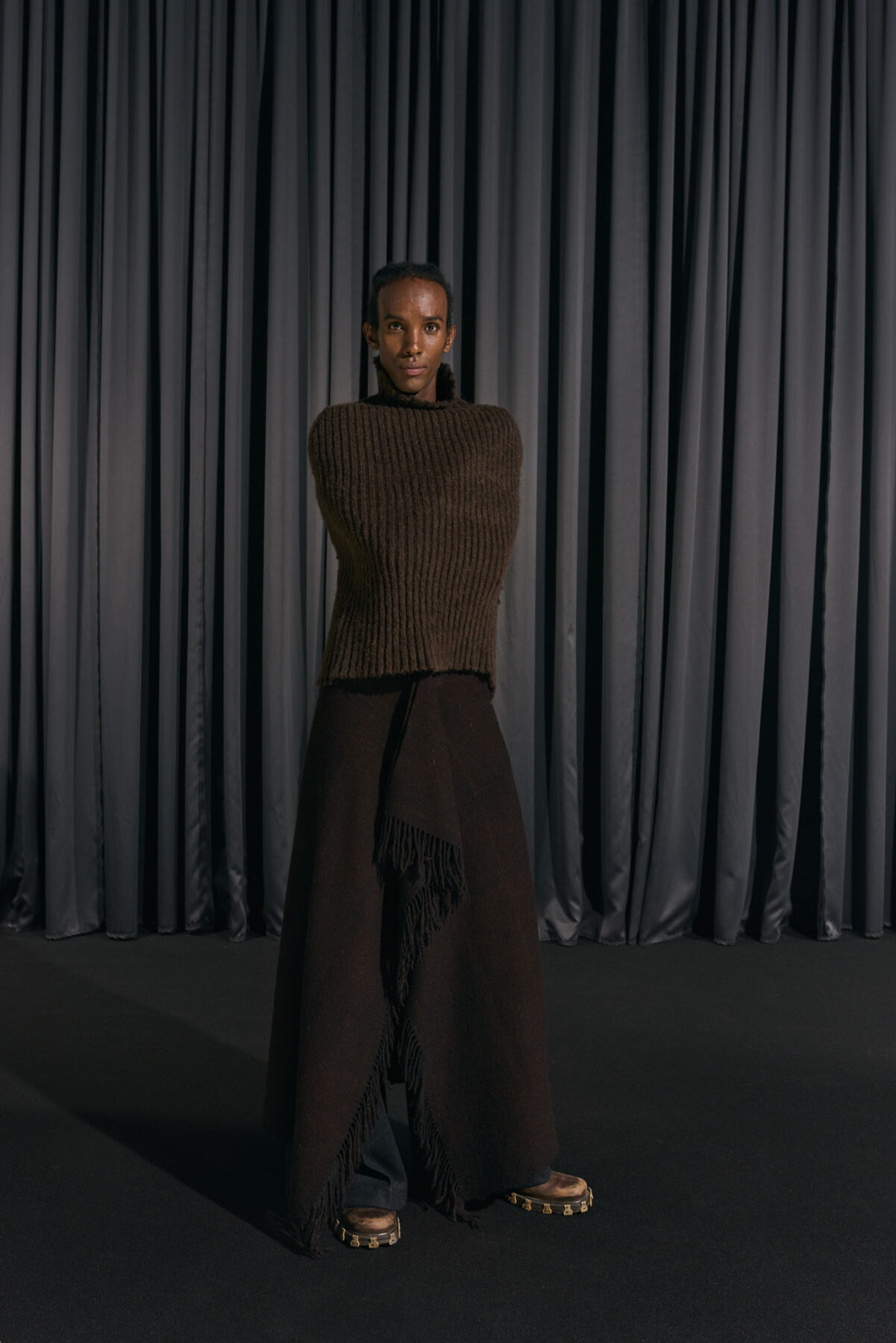 Model wearing Aalto University graduate collection