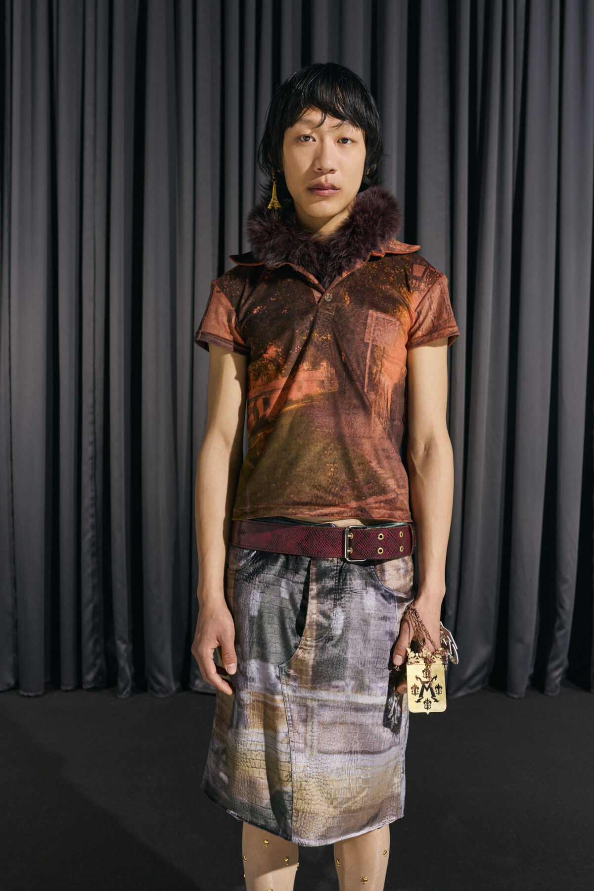 Model wearing Aalto University graduate collection