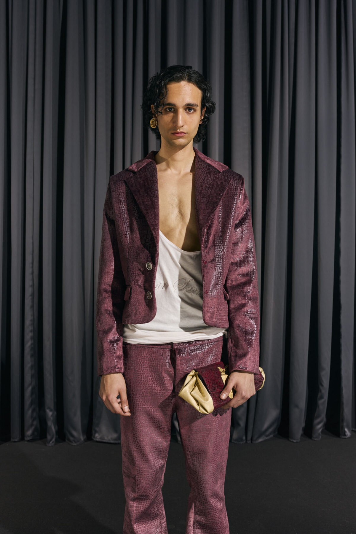 Model wearing Aalto University graduate collection