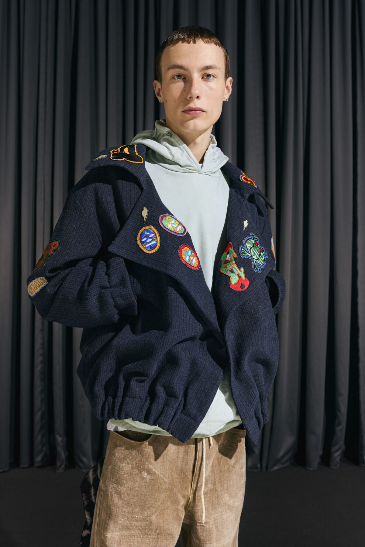 Model wearing Aalto University graduate collection