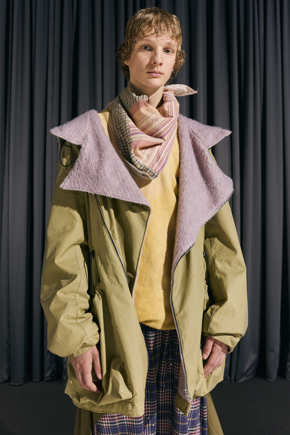 Model wearing Aalto University graduate collection