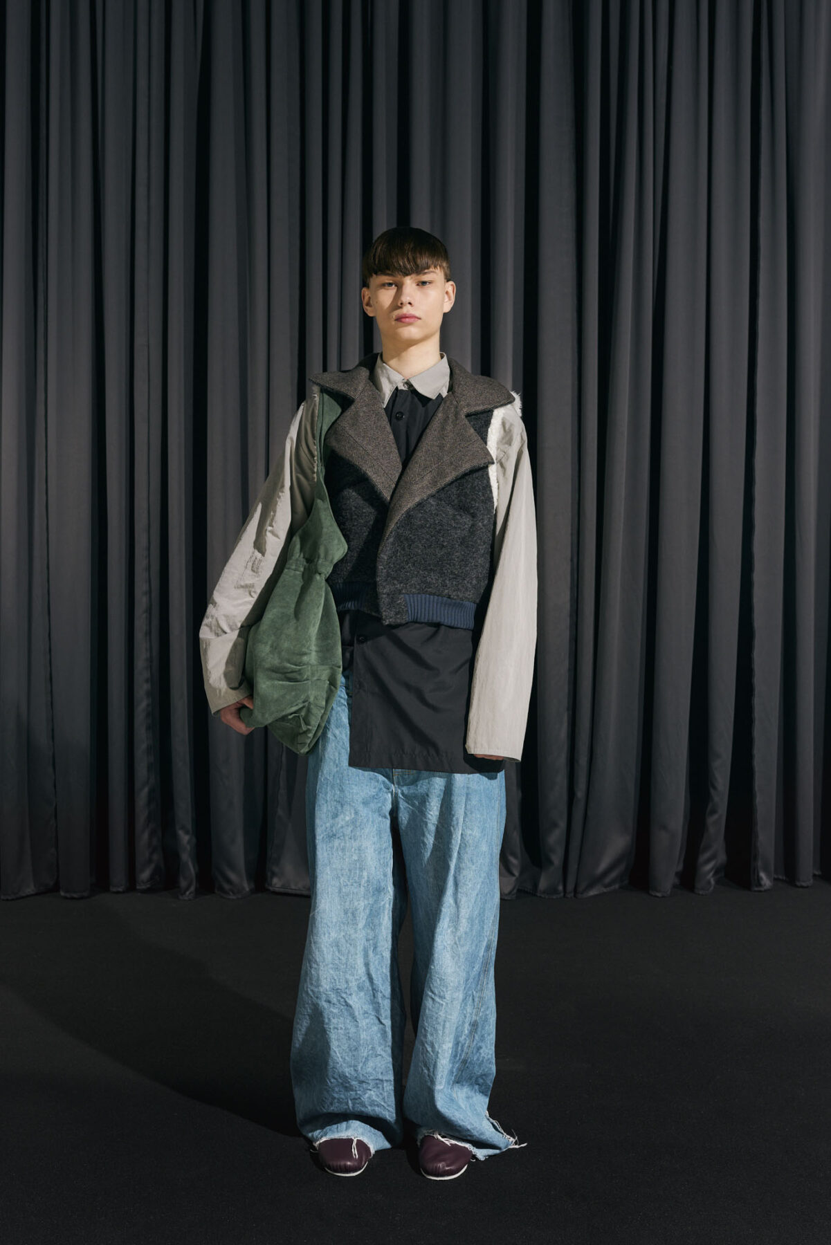 Model wearing Aalto University graduate collection