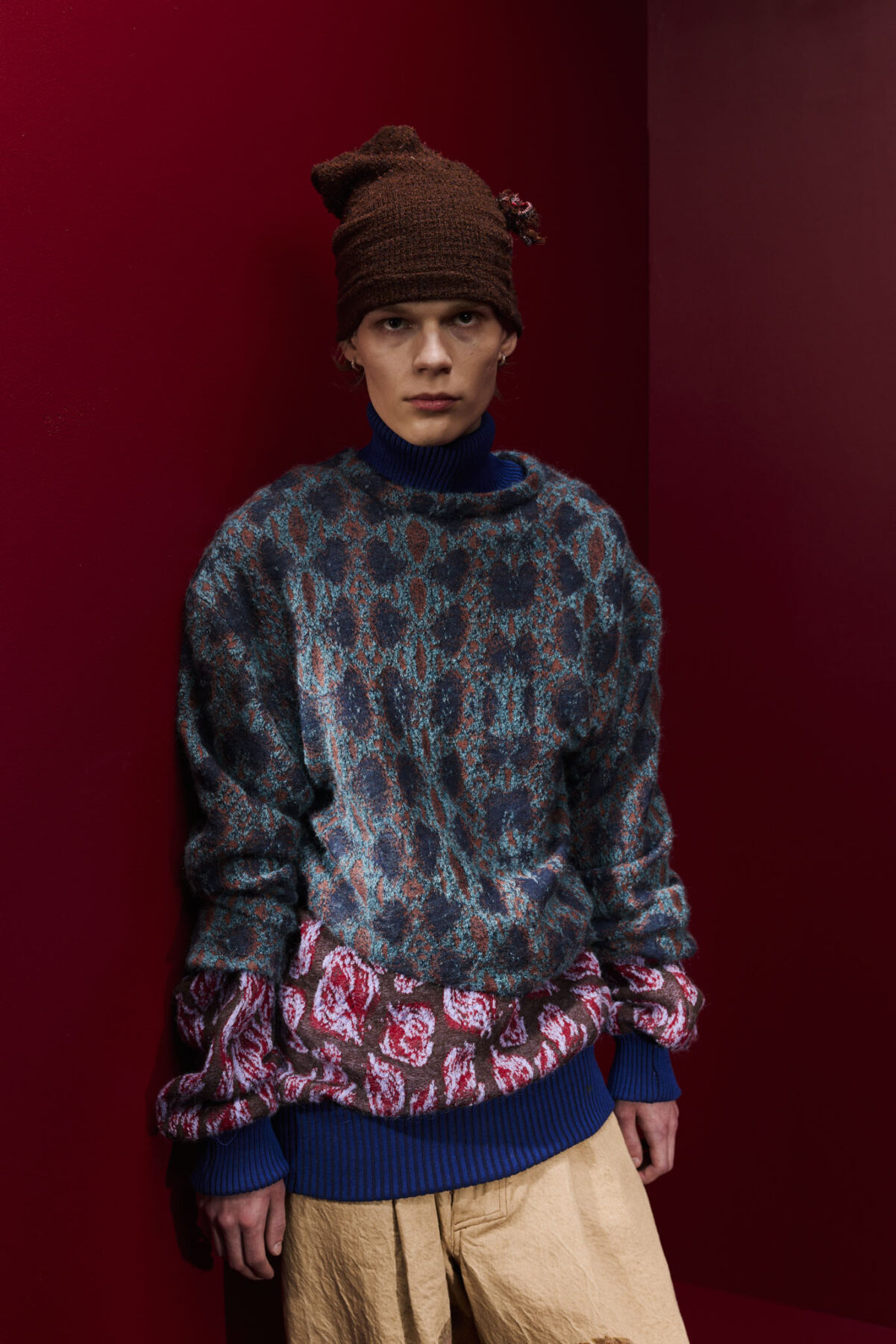 Model wearing Aalto University graduate collection