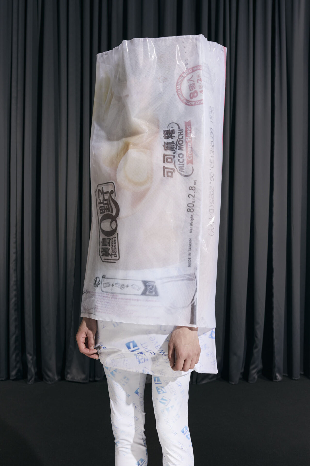 Model wearing Aalto University graduate collection