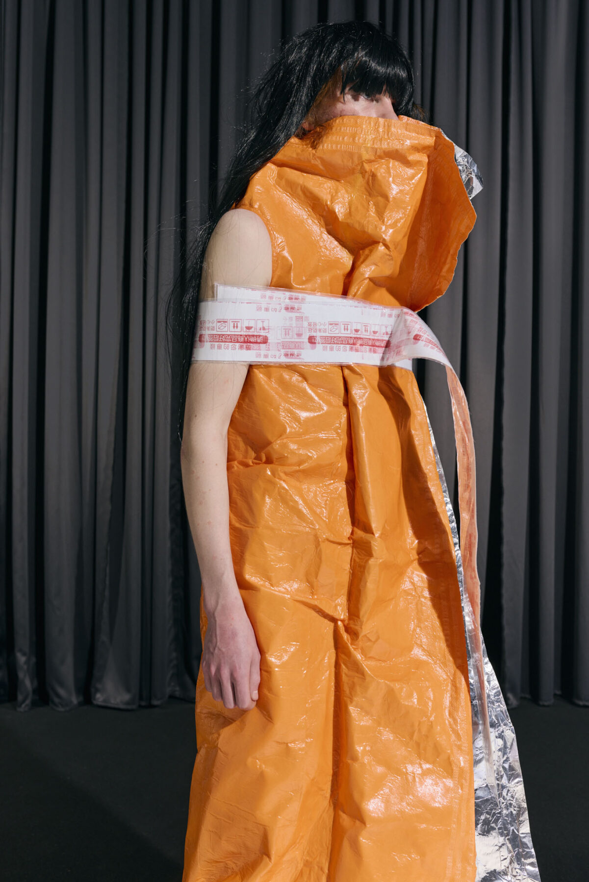 Model wearing Aalto University graduate collection