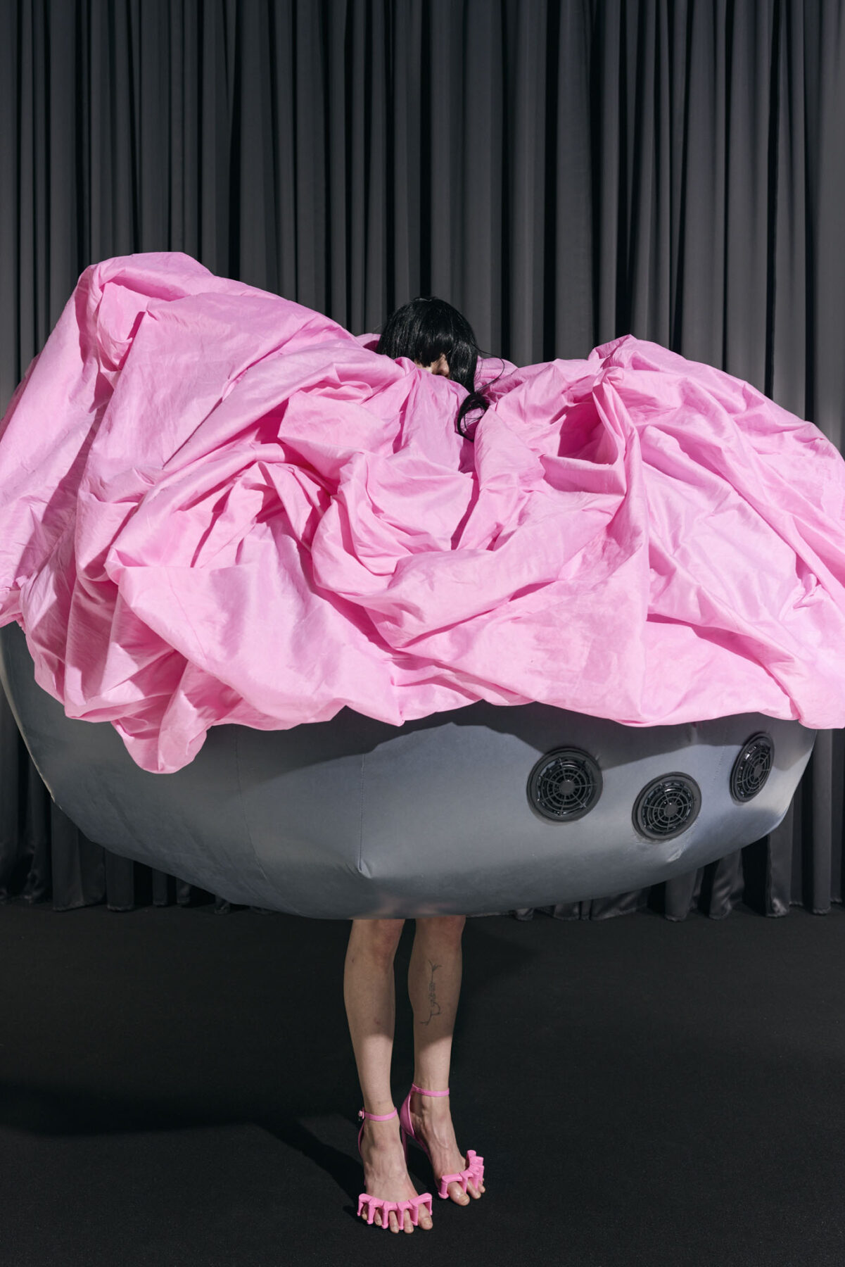 Model wearing Aalto University graduate collection