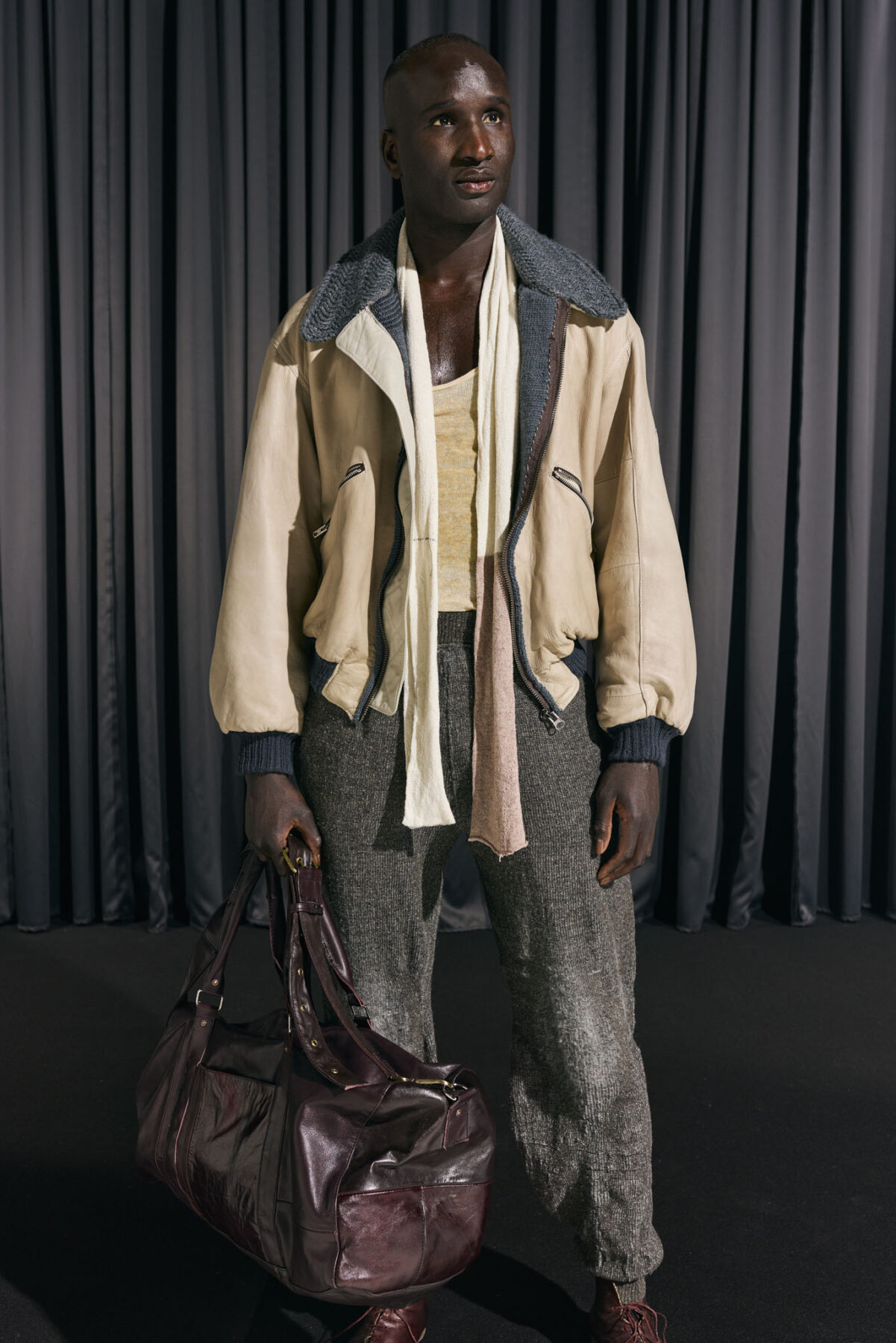 Model wearing Aalto University graduate collection
