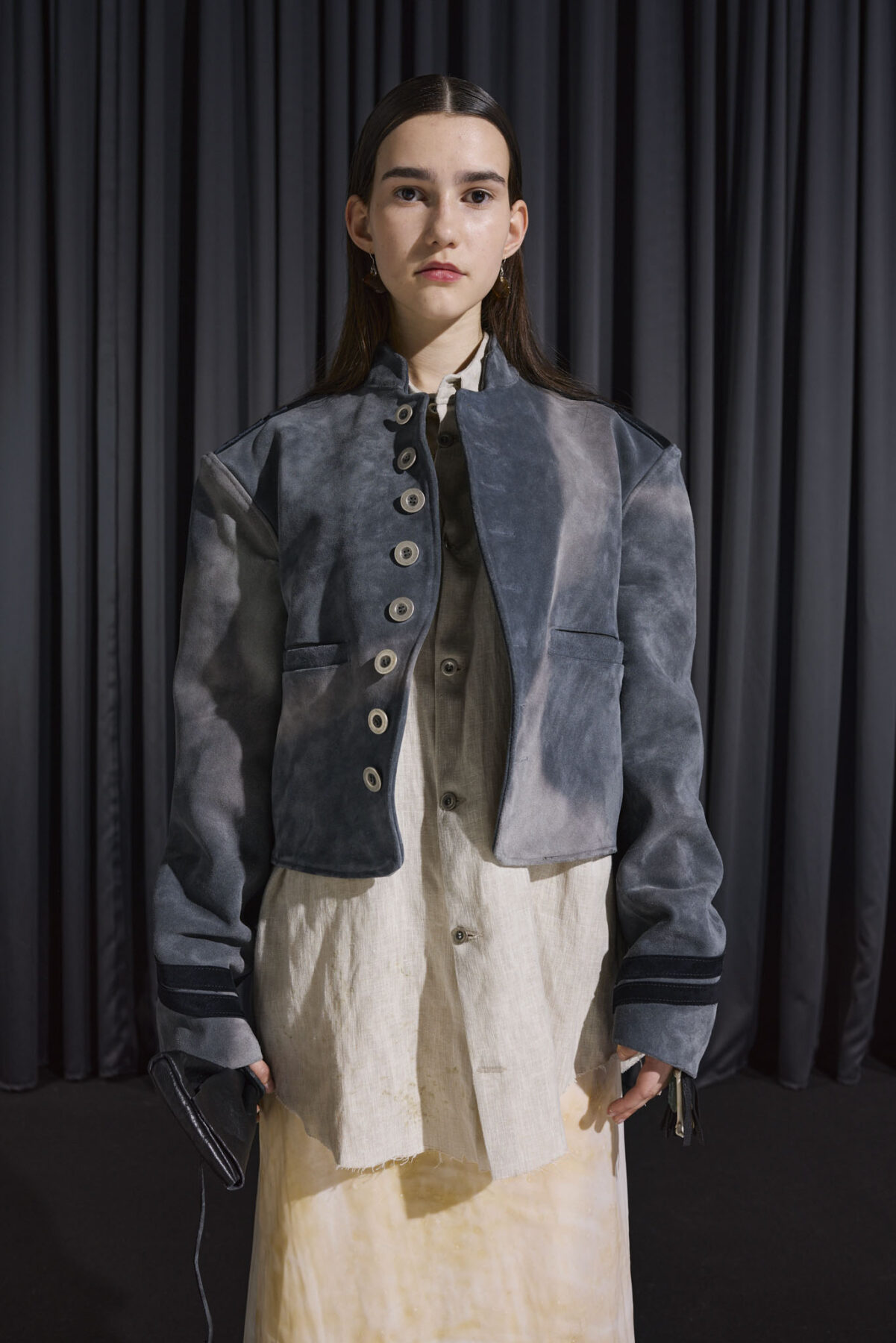 Model wearing Aalto University graduate collection