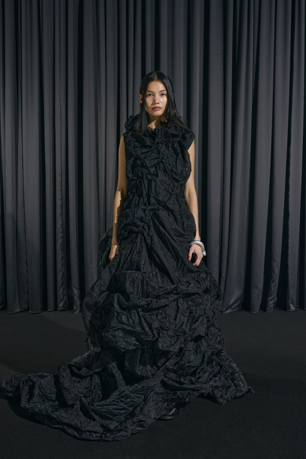 Model wearing Aalto University graduate collection