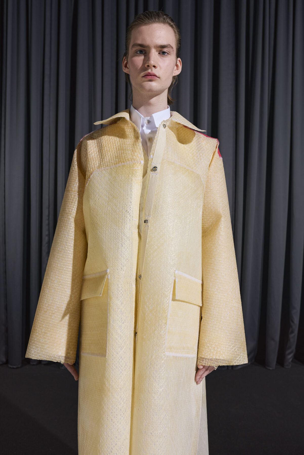 Model wearing Aalto University graduate collection