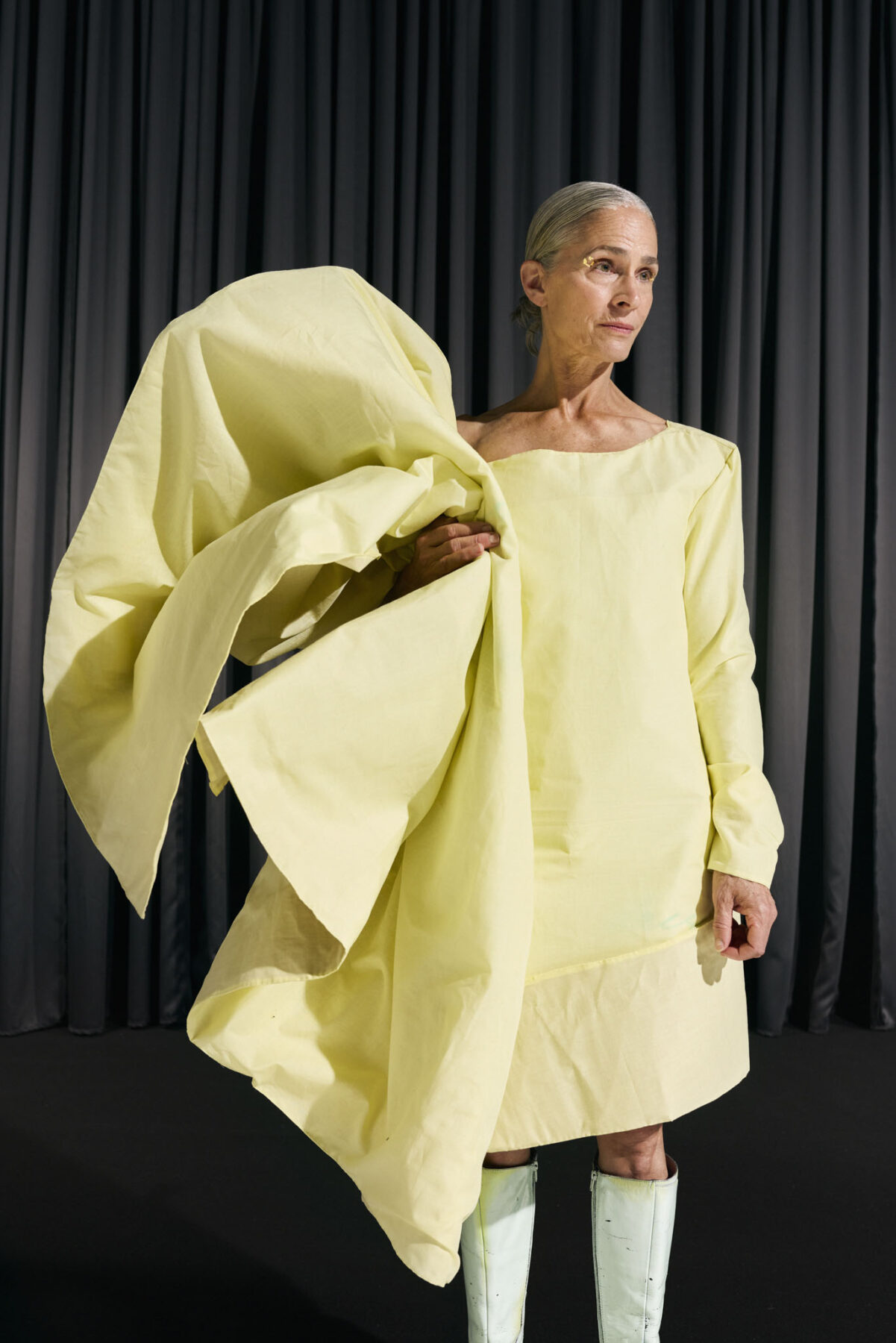 Model wearing Aalto University graduate collection