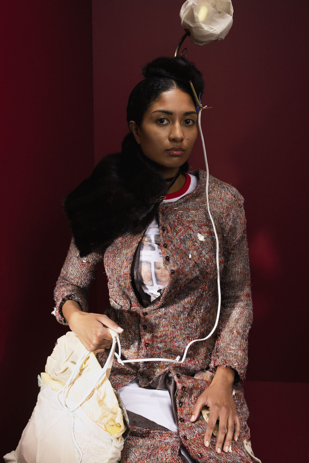 Model wearing Aalto University graduate collection