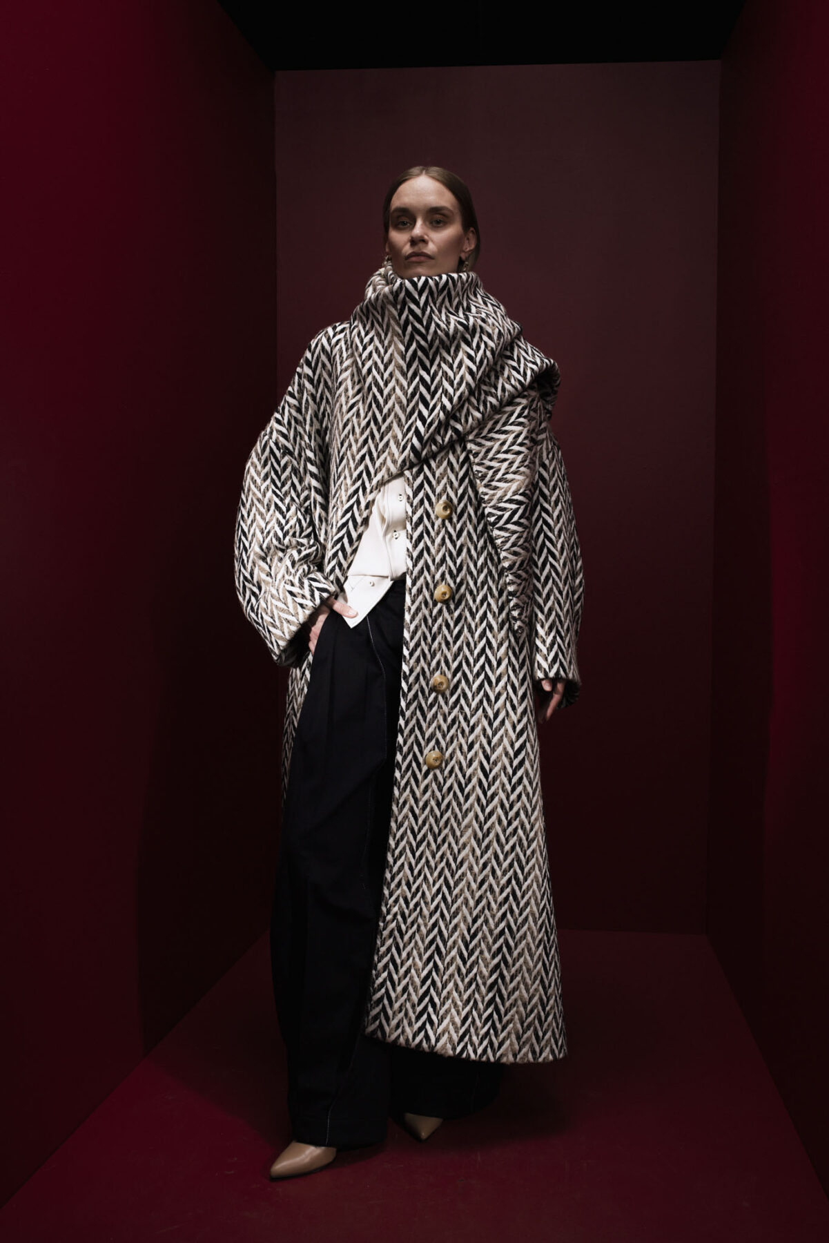 Model wearing Aalto University graduate collection