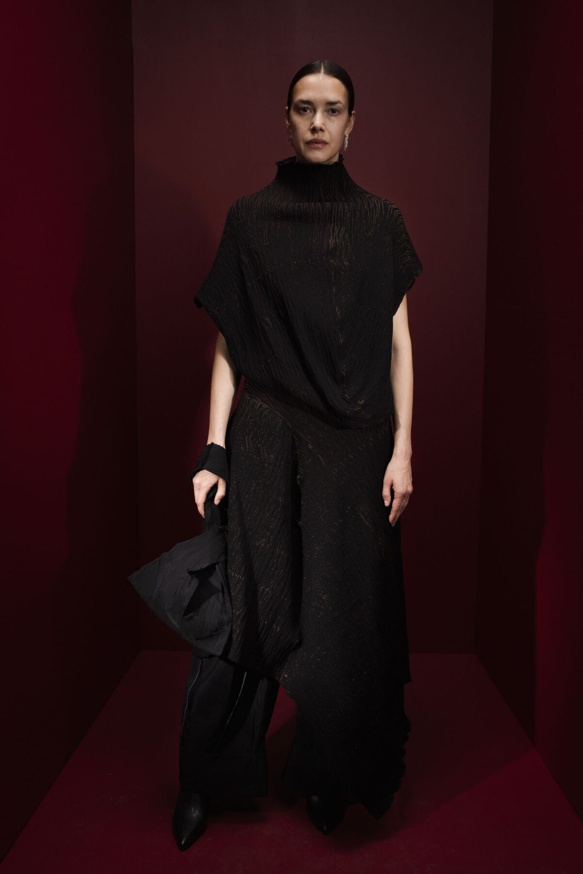 Model wearing Aalto University graduate collection