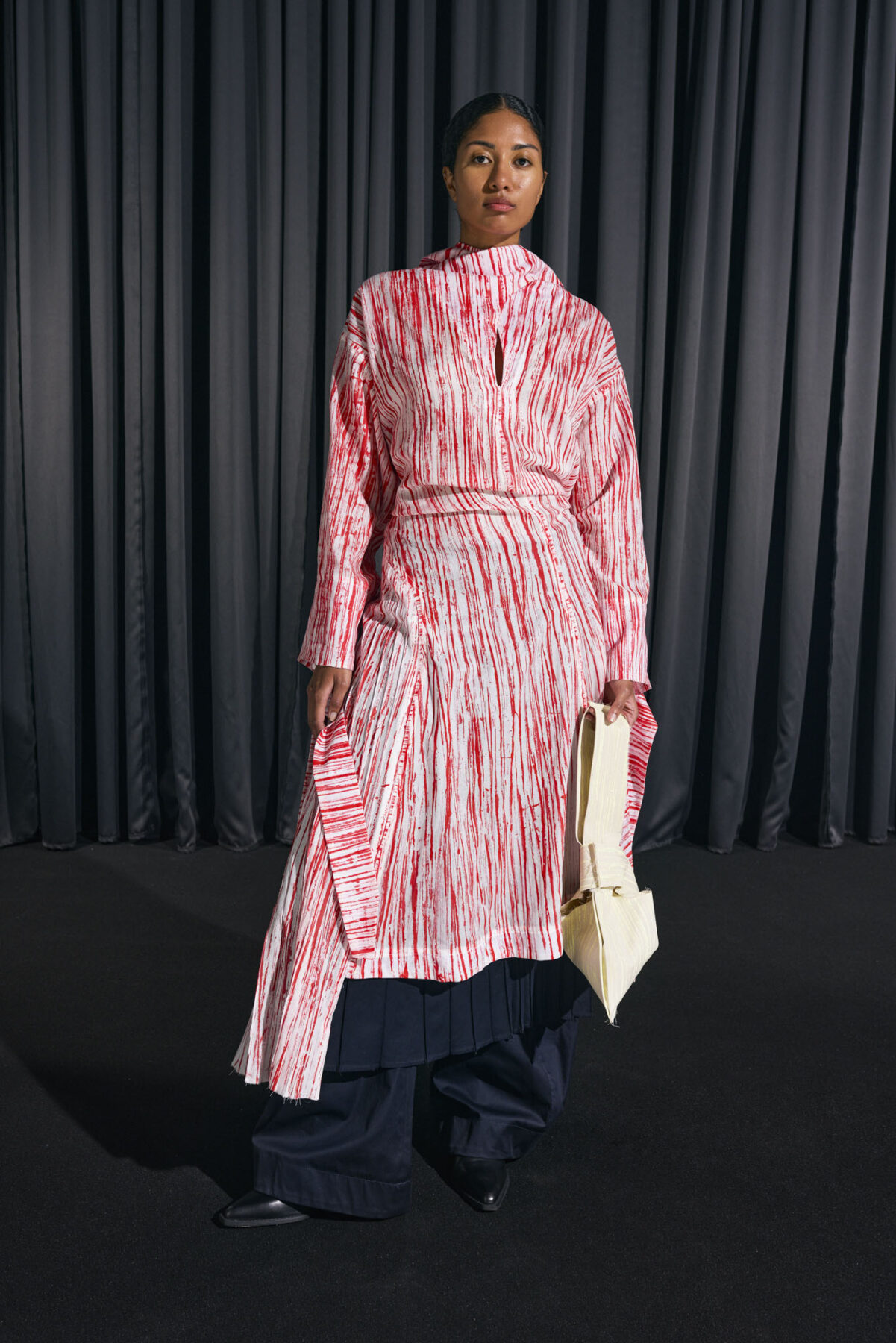 Model wearing Aalto University graduate collection
